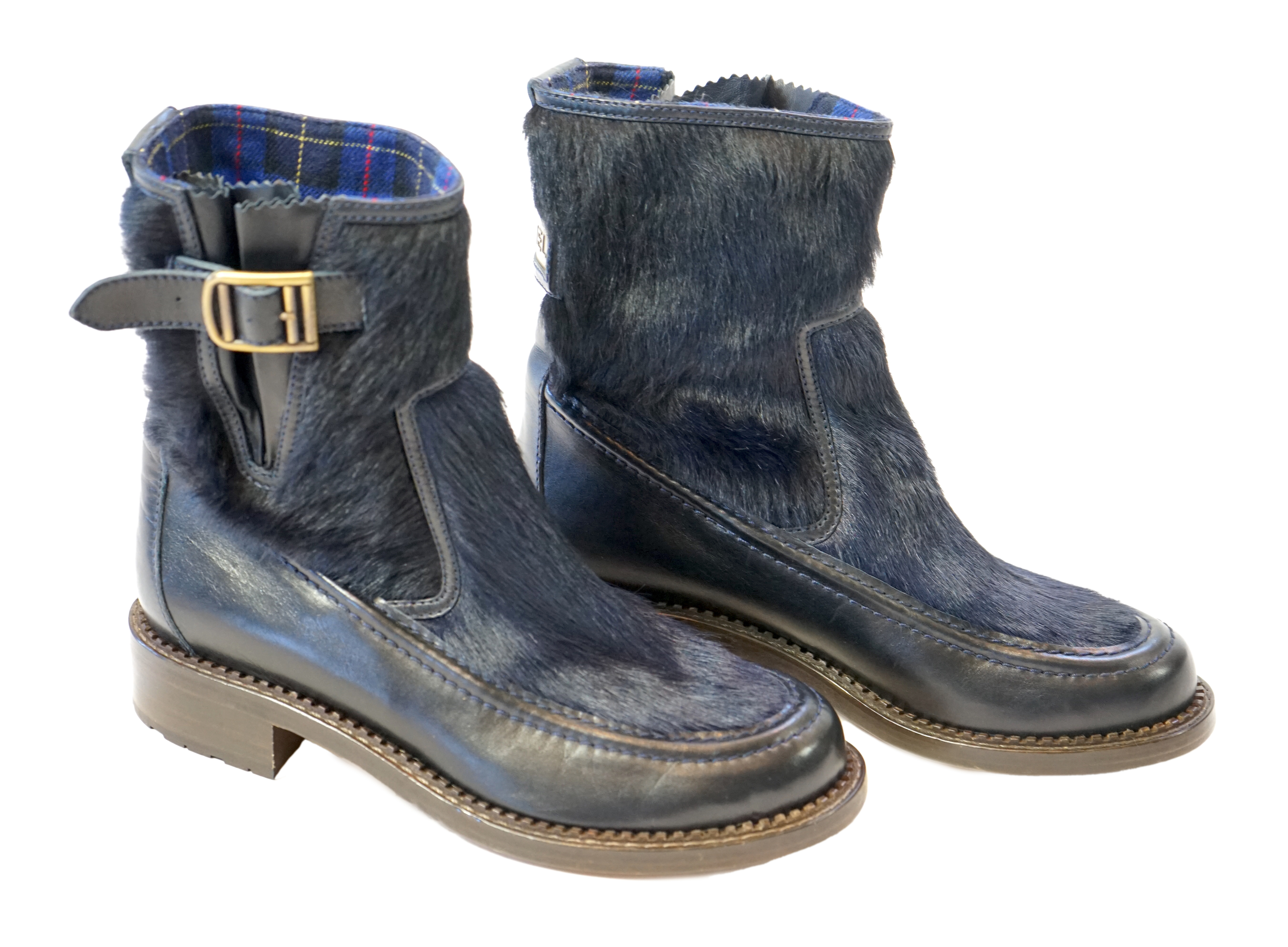 A pair of Chanel lady's navy blue leather calf hair pleated belted buckle boots, size EU 40.5